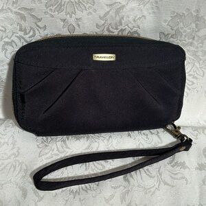 Travelon RFID zip around wallet with removable wristlet strap. New condition.